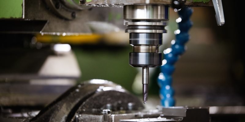 Machine tool in metal factory with drilling cnc machines